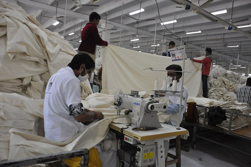 Islamic Relief staff prepare tents for distribution in the Philippines.