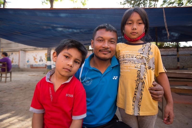 Sarana with her father and brother